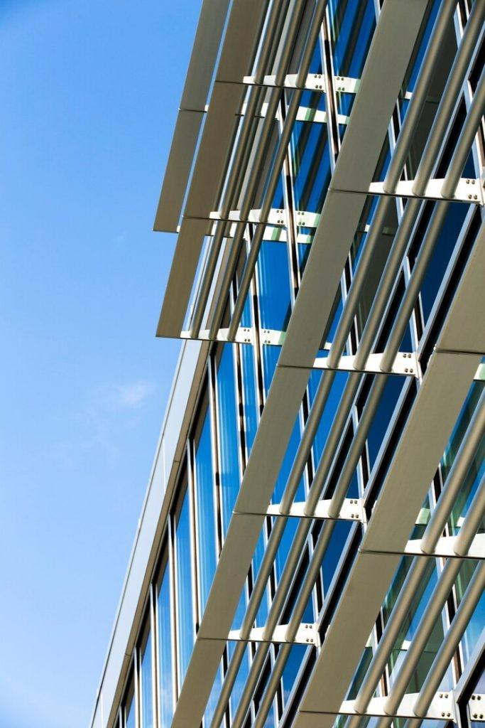 High-rise glass panel placement